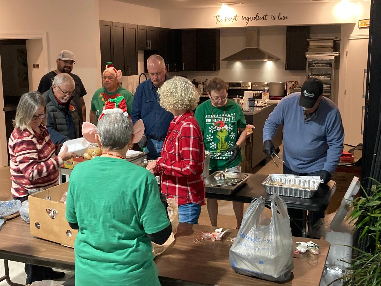 serving dinner at Share the Table